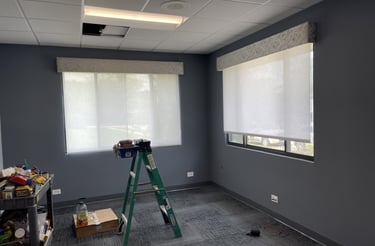 in progress office renovation with new shades and modern carpet design