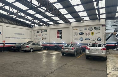 Automóviles en reparación dentro de PITS®