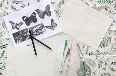 a pair of scissors and a pair of scissors on a bed