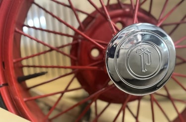 1929 Plymouth spare spoke wheel at VerHage Mopar Museum