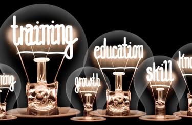 a group of light bulbs with the words learning english in front of a black background