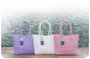 Handwoven tote bags handmade from recycled plastic with durable and elegant design