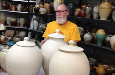 John McCoy with large pots