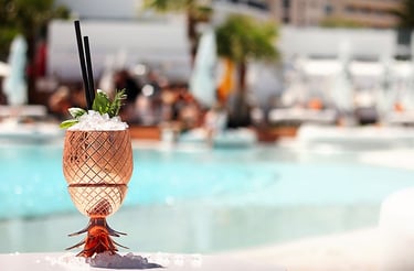 a cocktail in a pineapple cocktail glass