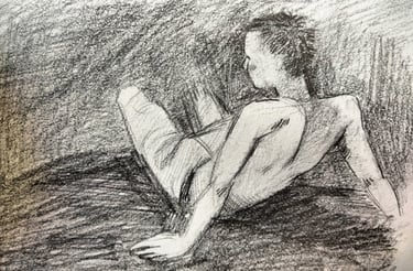 a graphite drawing of a man sitting on a rock near water