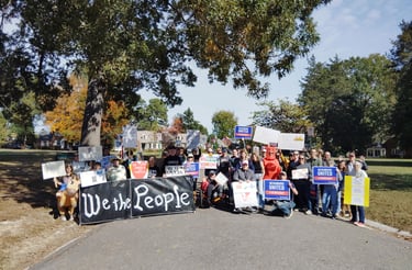 Neighbors prepare for our first community micro-march.