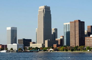 A welcoming office reception desk with event planning materials and a friendly smile.