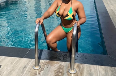 Kingston luxury companion Summer Jones in swimsuit by pool