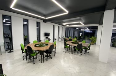 a conference room with a table and chairs