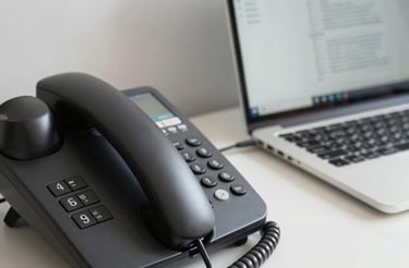 A police van with red and blue markings is in motion on a road, likely in an urban setting. The image captures a sense of speed with a blurred background, and a person is visible inside the van.