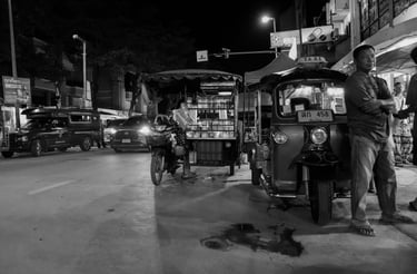 Atmosphere of a street in Chiang Mai, Thailand, including TuK Tuk Taxi