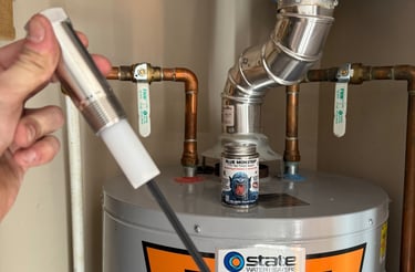 Water heater maintenance by Cherry Home Service – inspecting anode rod and plumbing setup in Glenwoo