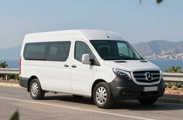 A cozy travel agency desk with a laptop open to a booking platform and a map of Portugal and Spain on the wall.