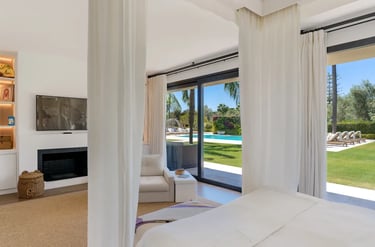 suite with terrace access and pool views at Villa El Olivo, Marbella