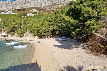 The photo shows Rape's western end, the best beach for families with children.