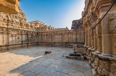 Close-up view of intricate stone carvings and sculpted pillars at Bhoga Nandeeshwara Temple near Nandi Hills