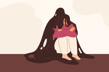 pessoa encolhida no chao com crise de ansiedade