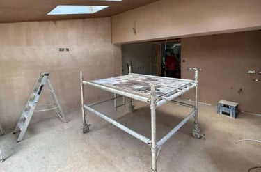 Smooth plaster finish applied to a living room wall by Franklins Plastering in Worcester.