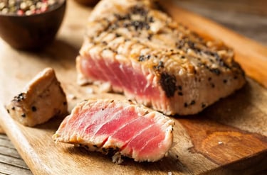 Seared tuna steak with pepper crust, a fine dining dish served in Marbella