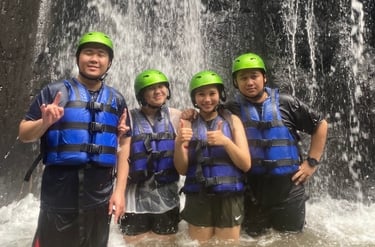 Scenic waterfall along the Ayung River during white water rafting in Ubud, Bali