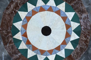 Acrylic painting including details of marble floor mosaic in shape of mandela 