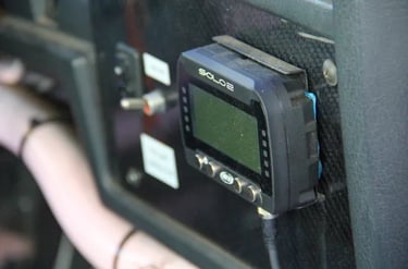 Motorsports Data Logger installed on race seat NASA Member Benefits Motorsports Gear