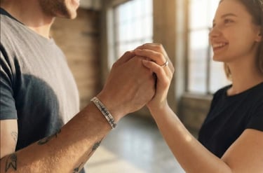 A man and a woman holding hands