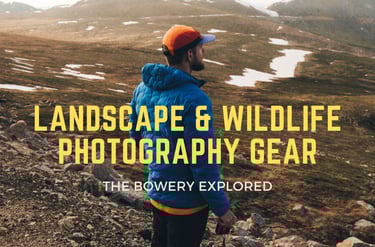 Photo by Ryan Klein showing Nate Bowery overlooking the Rocky Mountains camera in hand