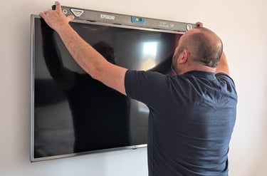 Me hanging a TV