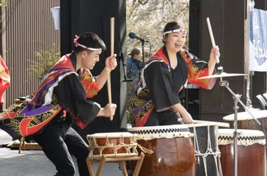 the Mark H Taiko Connection performs on stage