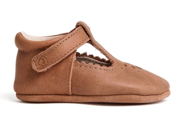 Product photography - a baby's shoe with a brown leatherette