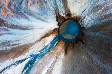 a blue and white flower with a blue sky.arbab naimat kasi balochistan Mud Valcano