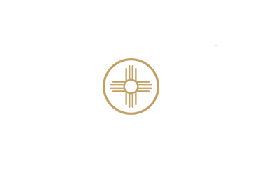 A gold Zia sun symbol logo centered on a solid black background.