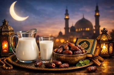 Ramadan iftar table with dates, milk and Quran beside them under lantern light representing the breaking of fast at sunset