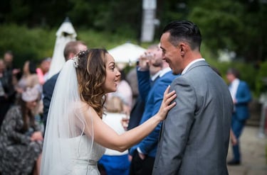 a bride chatting to one of her wedding guests