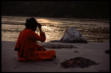 Deep in meditation, along the Ganges River in Rishikesh, India.