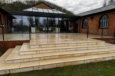 white patio layd in worcester by B R Building and Landscapes
