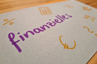 Finanzielles auf beschriebener Moderationskarte