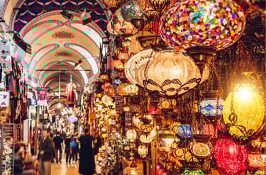 Handmade colorful mosaic Turkish lamps hanging in the historic Grand Bazaar of Istanbul.