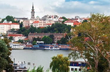 Panoramic view of Belgrade city skyline and the Sava river with boats in Serbia.
