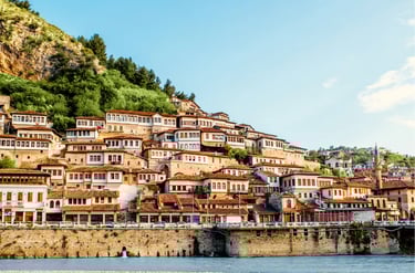 Historic Ottoman houses in Berat, Albania, known as the city of a thousand windows by the Osum River.