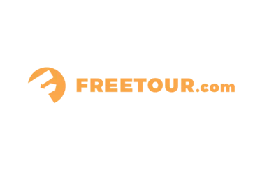 Official FREETOUR.com logo featuring an orange 'F' emblem and text on a black background.