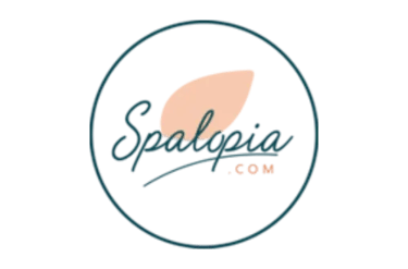 Spalopia.com official logo featuring elegant script text and a peach leaf icon in a circular frame.
