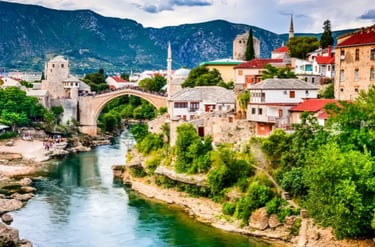 The historic Stari Most arched bridge over the Neretva River in Mostar, Bosnia and Herzegovina.