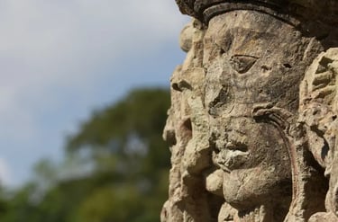 Close-up profile of an ancient Maya stone sculpture carving at the Copan ruins in Honduras.