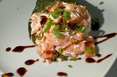 a plate of food with sauce and sauce on it