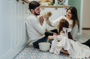 Happy family enjoying a cleaner, healthier home after KLEAN WELL grout cleaning service