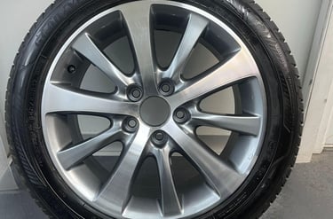 Close-up of a repaired diamond cut alloy wheel in Malvern