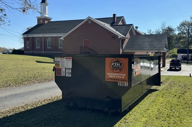 Roll Off Dumpster In Front of a Church