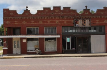 Water damage restoration in Granger, TX home with standing water on hardwood floors